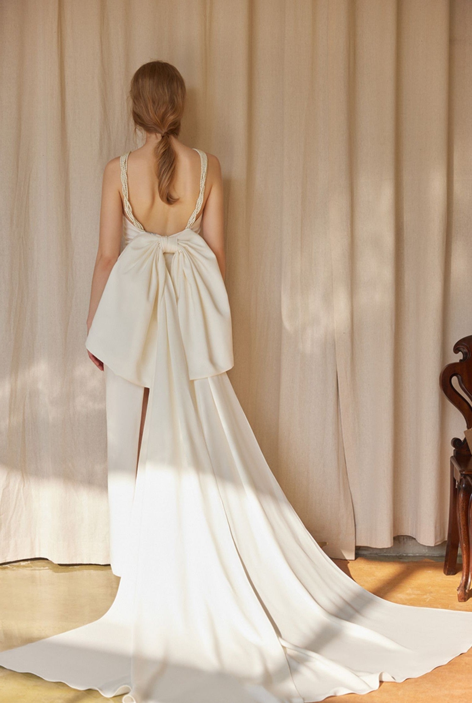 Pearl Strap Halter Satin Wedding Dress with Dramatic Back Bow and Train SelenaHuanStudio