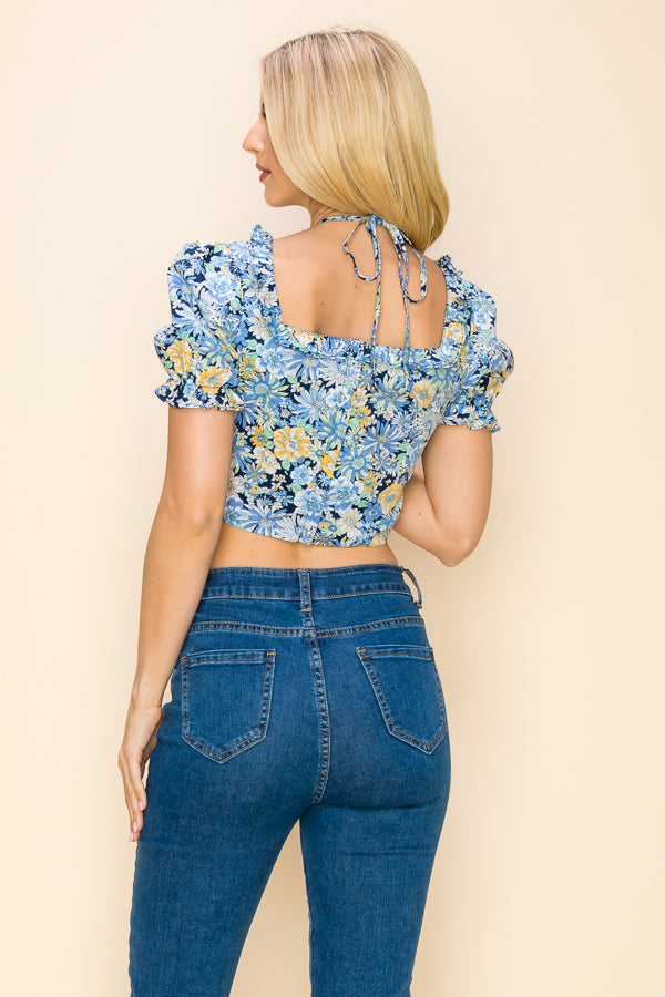 Multi color floral crop top with short sleeves and cut out design Bella Moda Latina