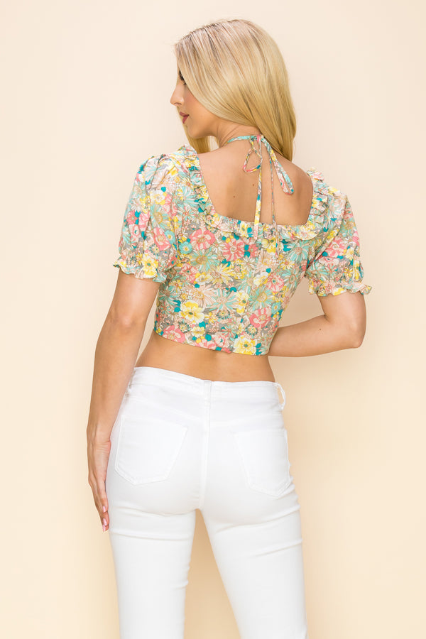 Multi color floral crop top with short sleeves and cut out design Bella Moda Latina
