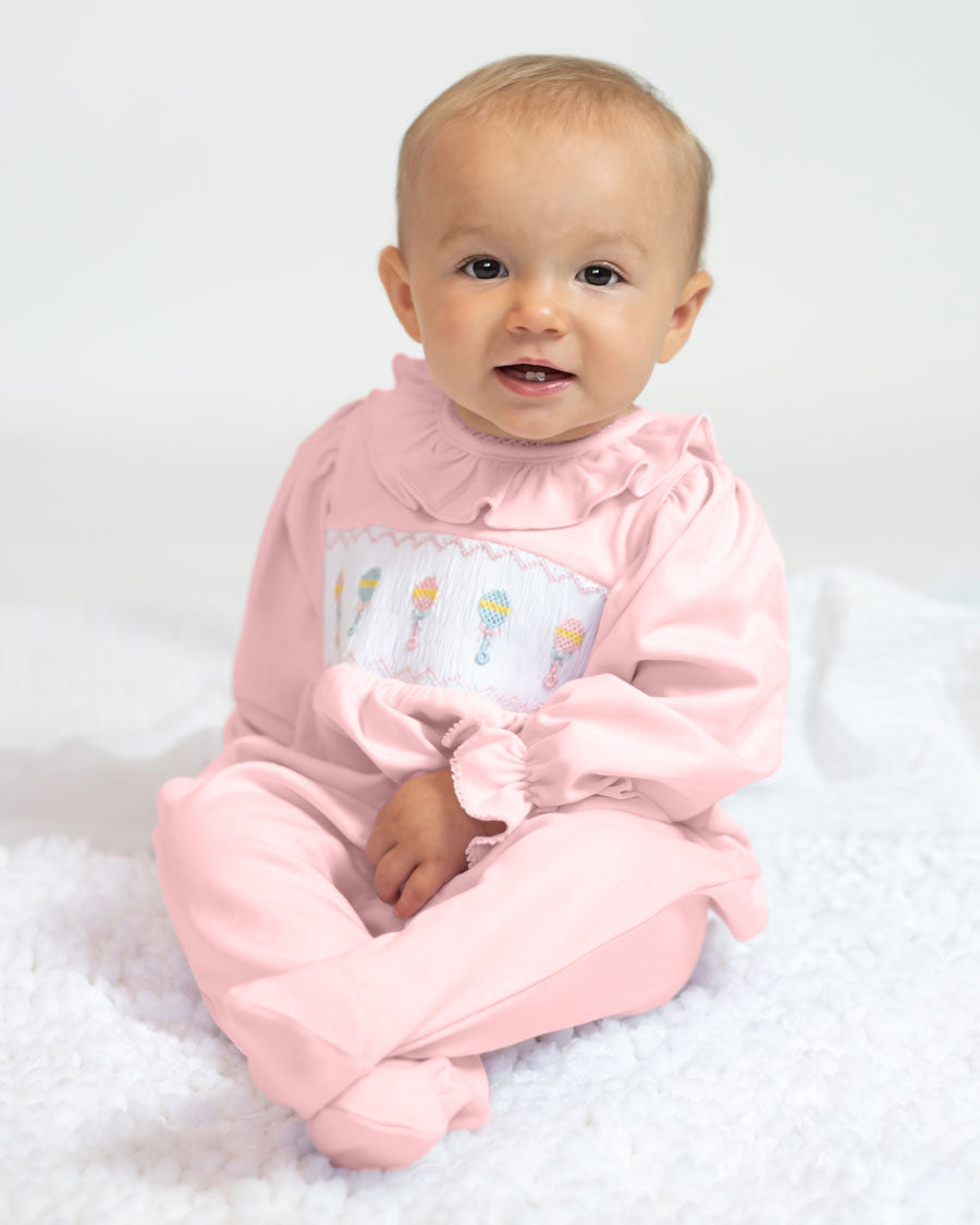 Baby Rattle Smocked Knit Onesie In Pink Smockingbird