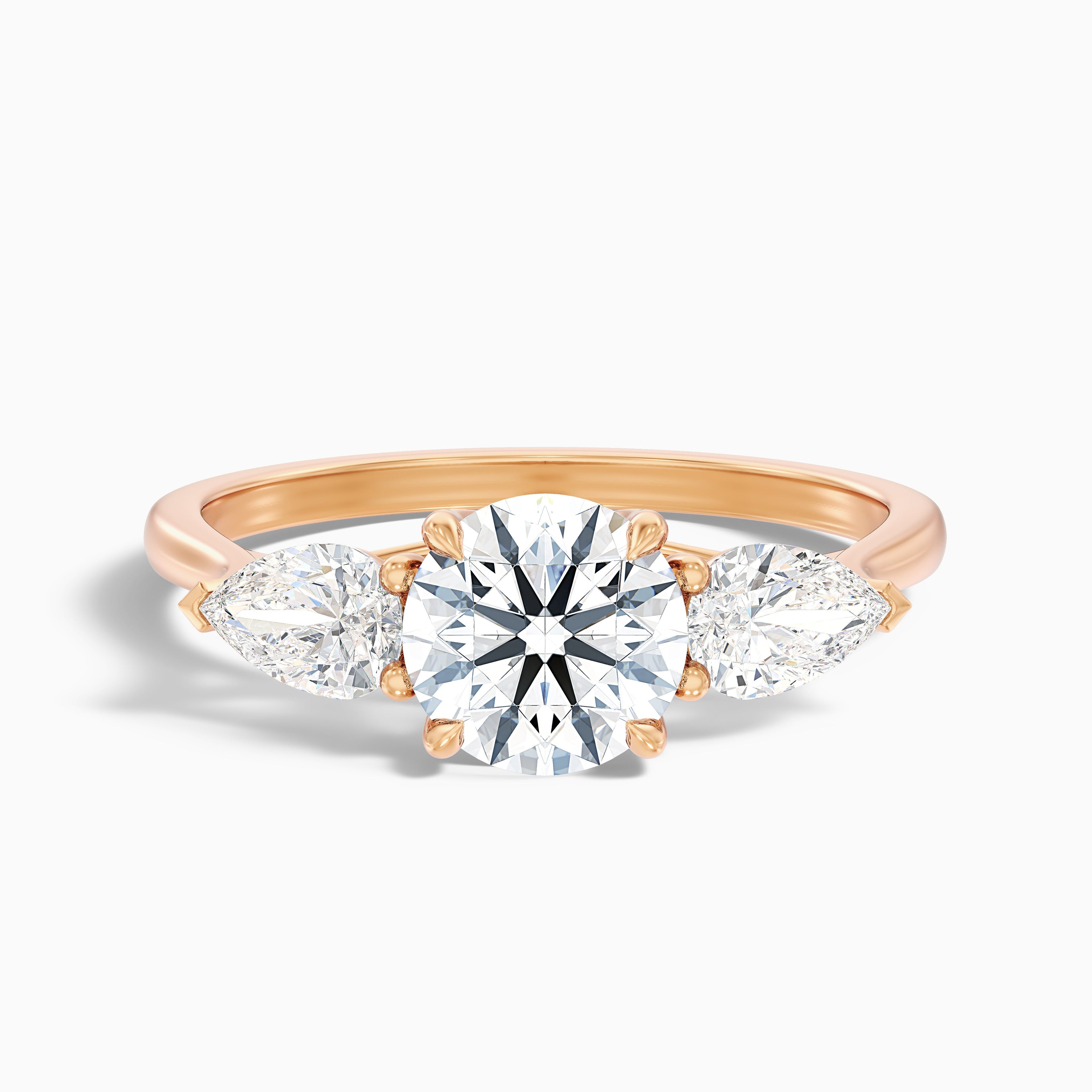 Amaya 2.5 Carat Round 3 Stone Moissanite Diamond Ring With Pear Side Stone in 14k White Gold