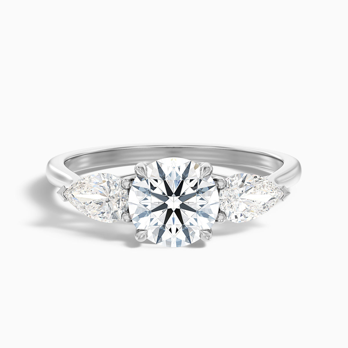 Amaya 2 Carat Round 3 Stone Moissanite Diamond Ring With Pear Side Stone in 10k Yellow Gold