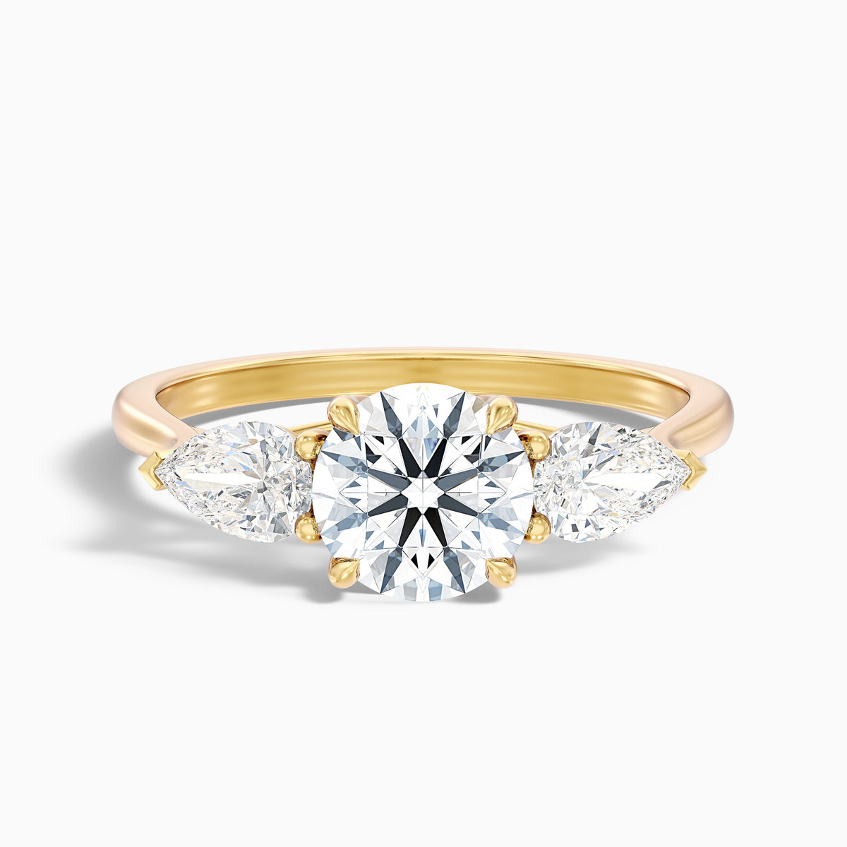 Amaya 2.5 Carat Round 3 Stone Moissanite Diamond Ring With Pear Side Stone in 14k Rose Gold