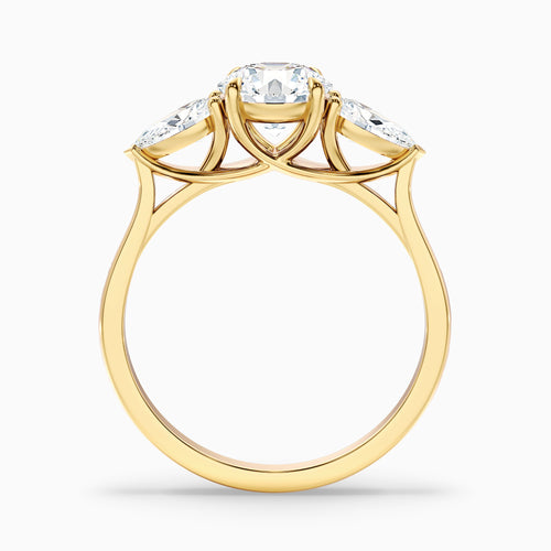 Amaya 4.5 Carat Round 3 Stone Moissanite Diamond Ring With Pear Side Stone in 10k Yellow Gold