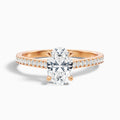 Carla 1 Carat Oval Cut Side Stone Pave Moissanite Diamond Ring in 10k Rose Gold