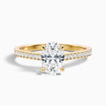 Carla 1.5 Carat Oval Cut Side Stone Pave Moissanite Diamond Ring in 14k Yellow Gold