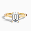 Ira 3 Carat Emerald Cut Solitaire Moissanite Engagement Ring in 18k Yellow Gold