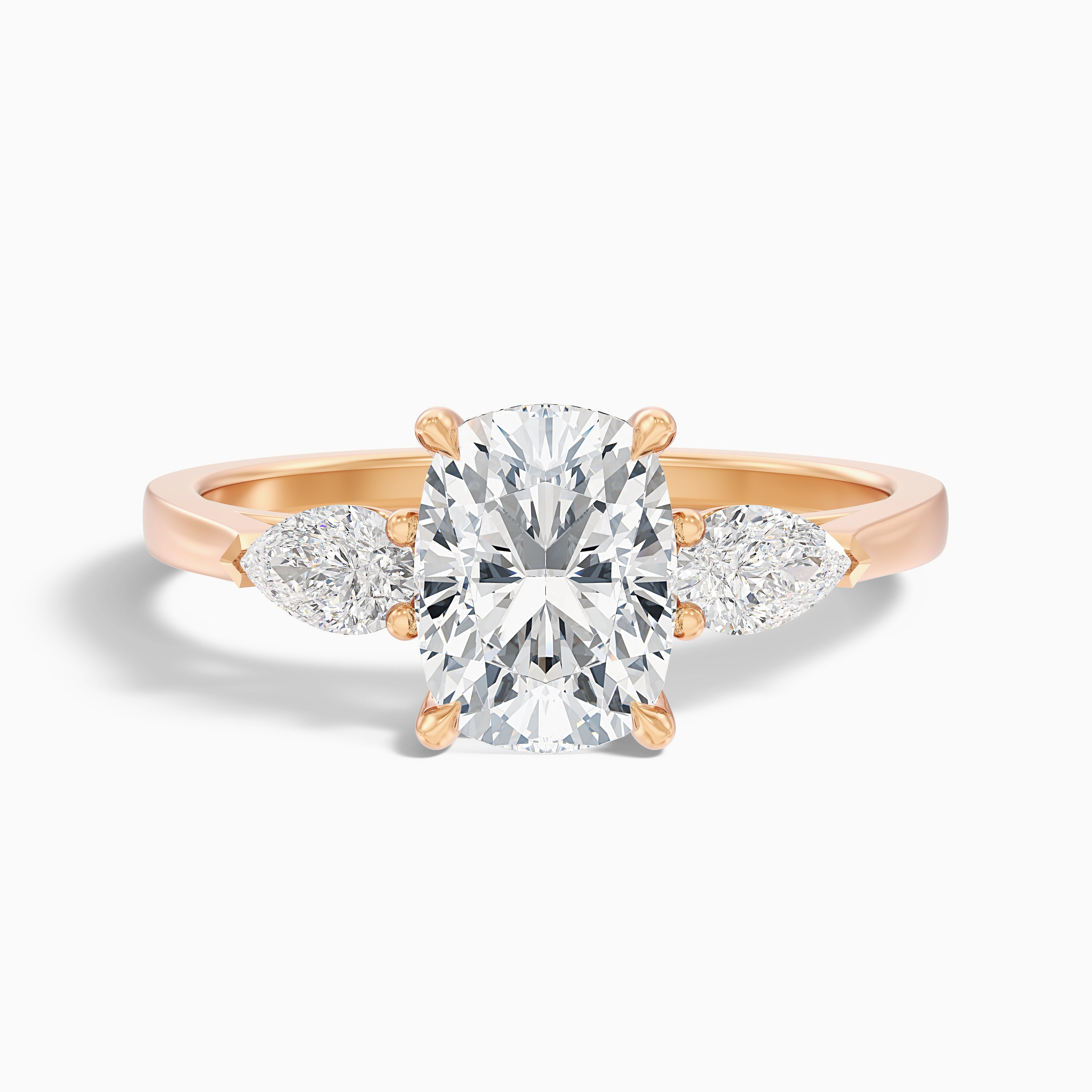 Haley 2.5 Carat Three Stone Ring with Pear Side Stones and an Elongated Cushion Lab Grown Diamond in 14k Yellow Gold