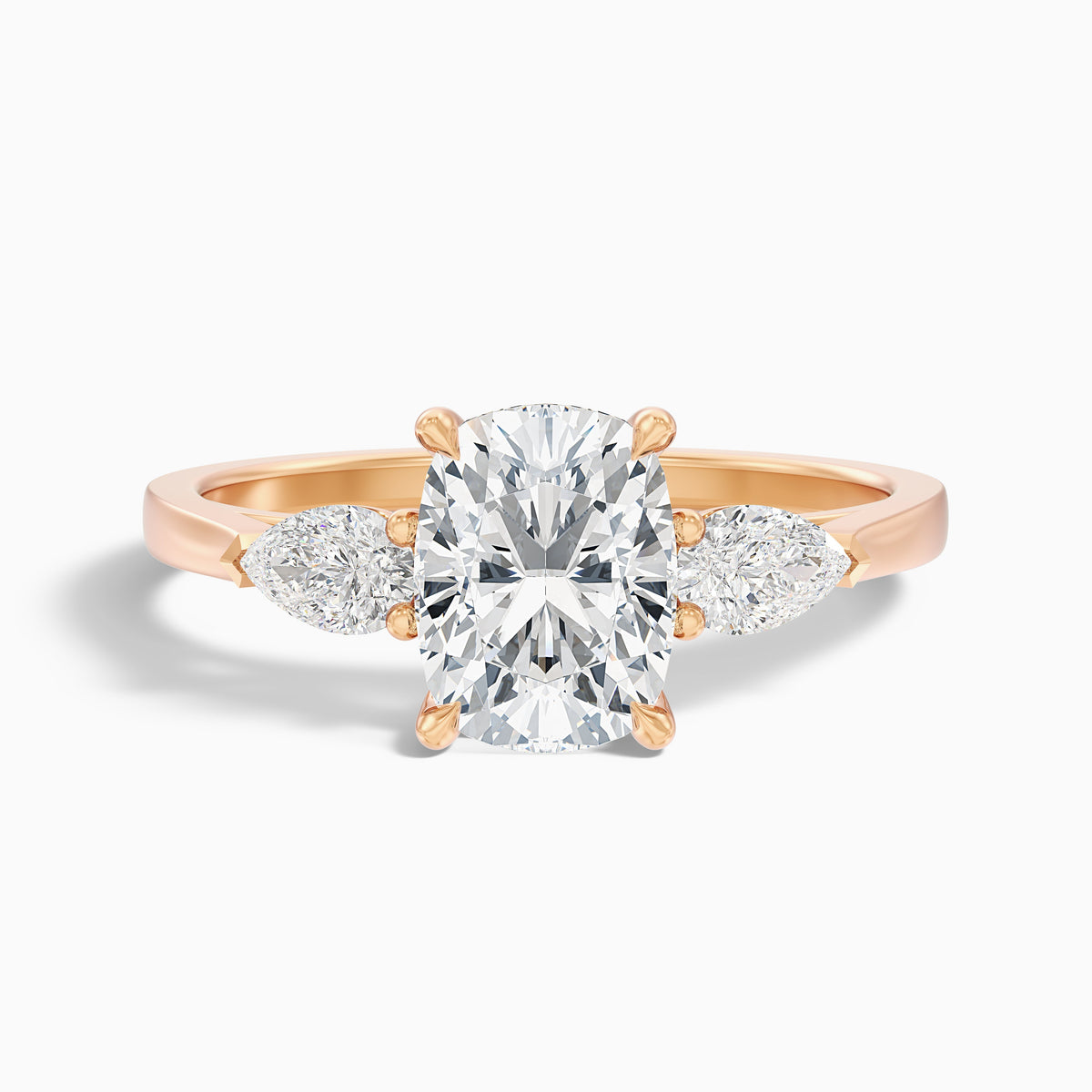 Haley 2.5 Carat Three Stone Ring with Pear Side Stones and an Elongated Cushion Lab Grown Diamond in 14k Yellow Gold