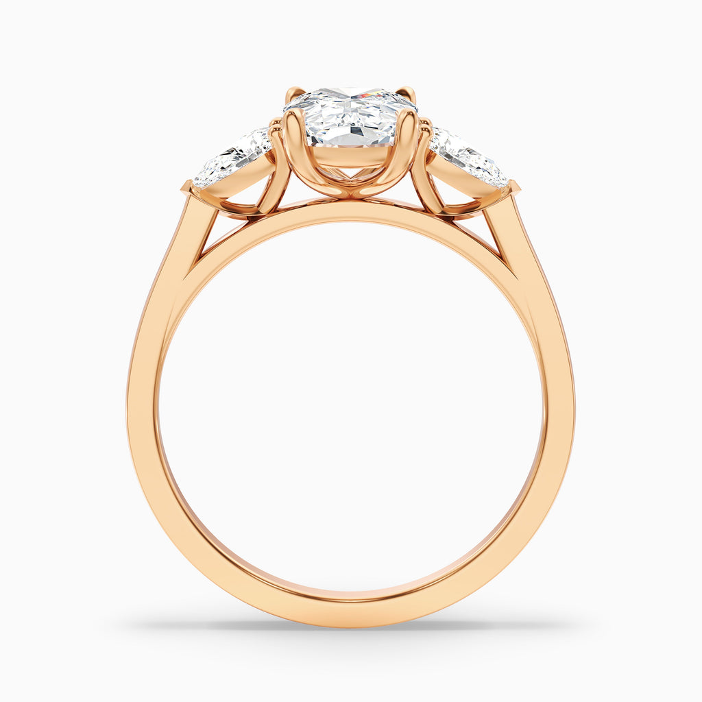 Haley 2.5 Carat Three Stone Ring with Pear Side Stones and an Elongated Cushion Lab Grown Diamond in 14k Yellow Gold