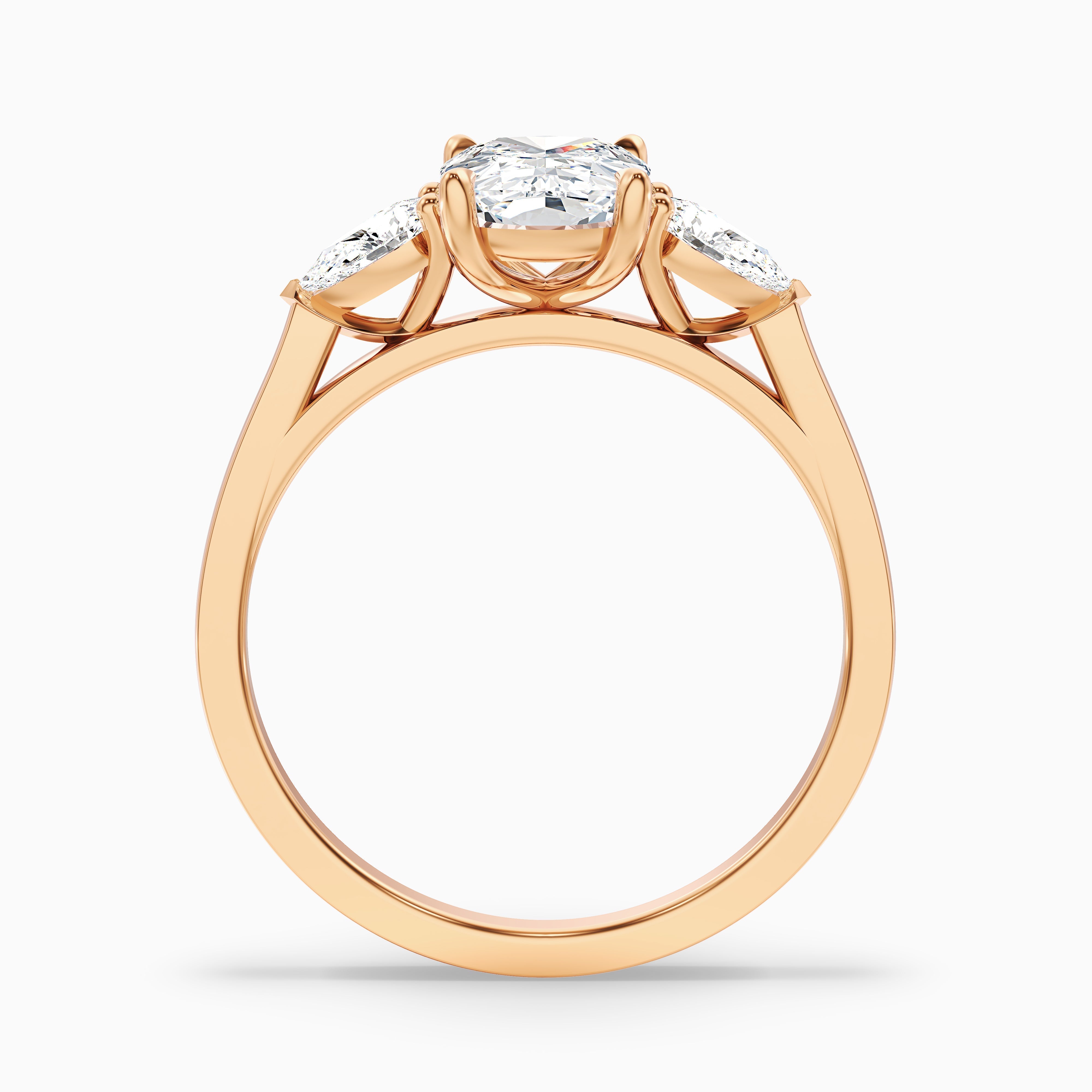 Haley 2.5 Carat Three Stone Ring with Pear Side Stones and an Elongated Cushion Lab Grown Diamond in 14k Yellow Gold