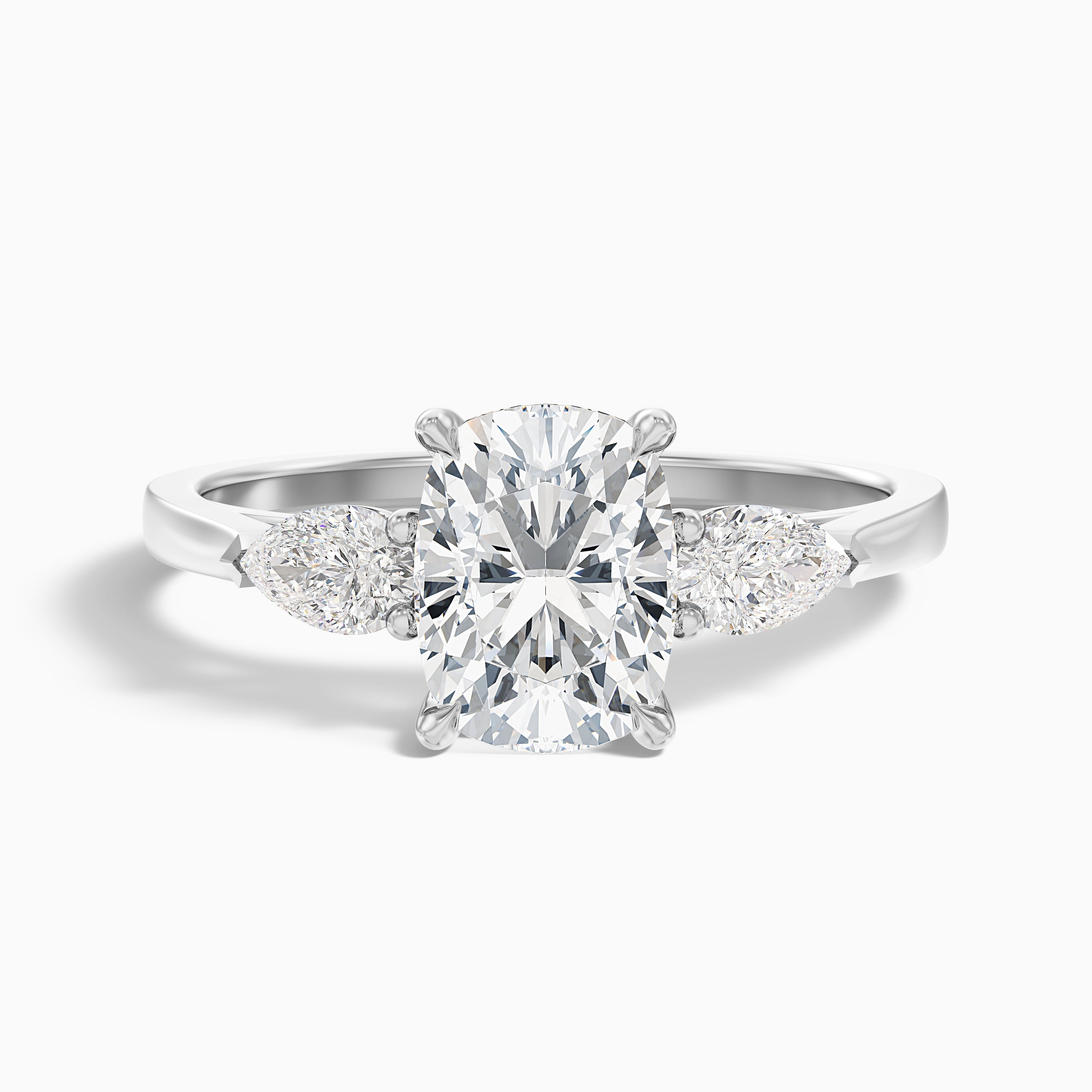 Haley 2.5 Carat Three Stone Ring with Pear Side Stones and an Elongated Cushion Lab Grown Diamond in 14k Yellow Gold
