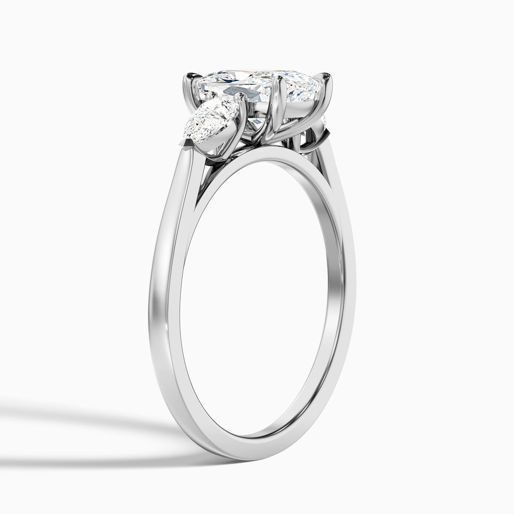 Haley 2.5 Carat Three Stone Ring with Pear Side Stones and an Elongated Cushion Lab Grown Diamond in 14k Yellow Gold