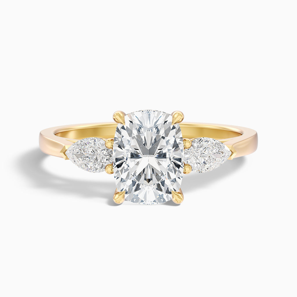 Haley 2.5 Carat Three Stone Ring with Pear Side Stones and an Elongated Cushion Lab Grown Diamond in 14k Yellow Gold