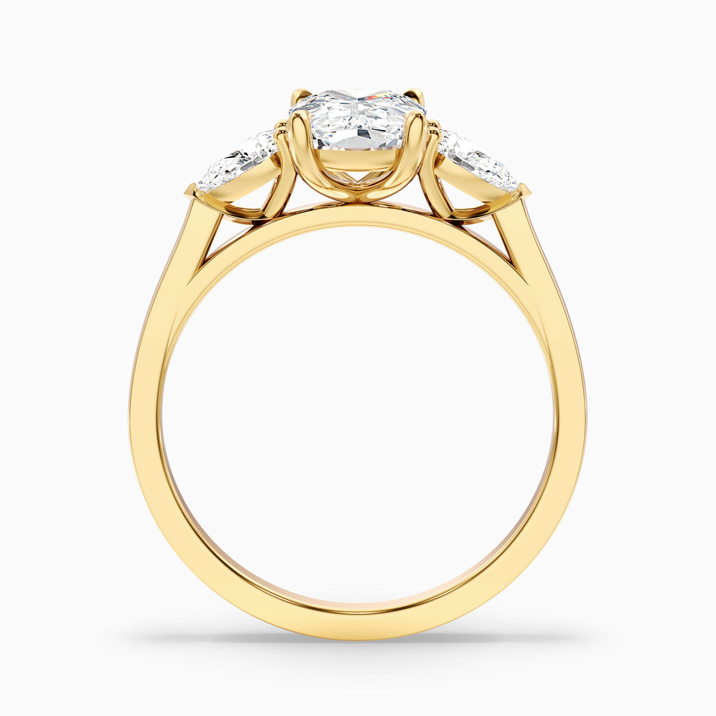 Haley 2.5 Carat Three Stone Ring with Pear Side Stones and an Elongated Cushion Lab Grown Diamond in 14k Yellow Gold
