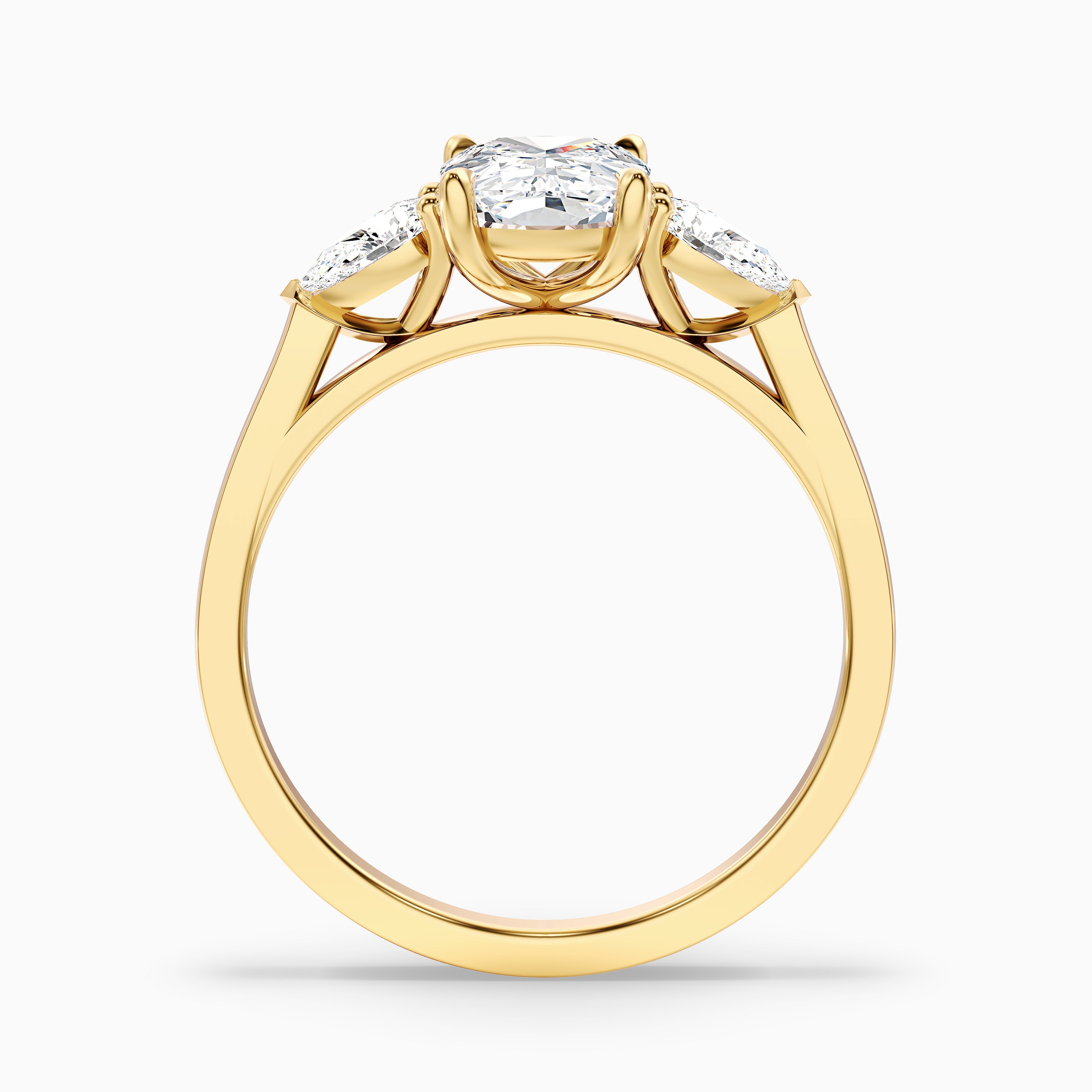 Haley 2.5 Carat Three Stone Ring with Pear Side Stones and an Elongated Cushion Lab Grown Diamond in 14k Yellow Gold