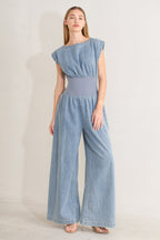RUNNING IN DENIM JUMPSUIT Flying Tomato