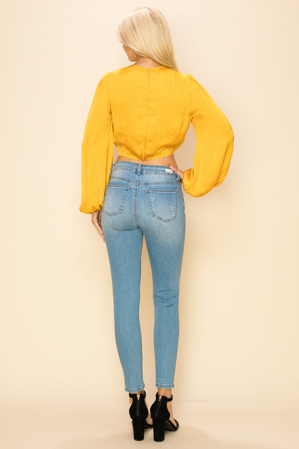 Long sleeve crop top with an open front design Bella Moda Latina