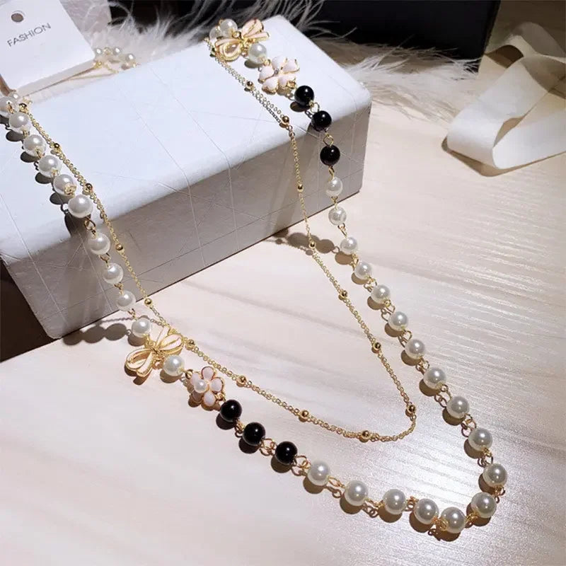 Famous Design Layered Pearls Beads Bow Flower Long Pendant Sweater Chain Necklace For Women